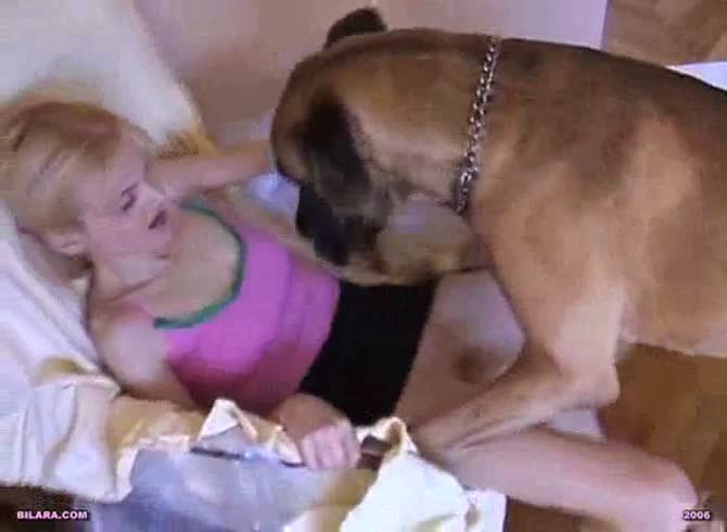 Video: Beautiful teen beastiality sex with a huge brown dog