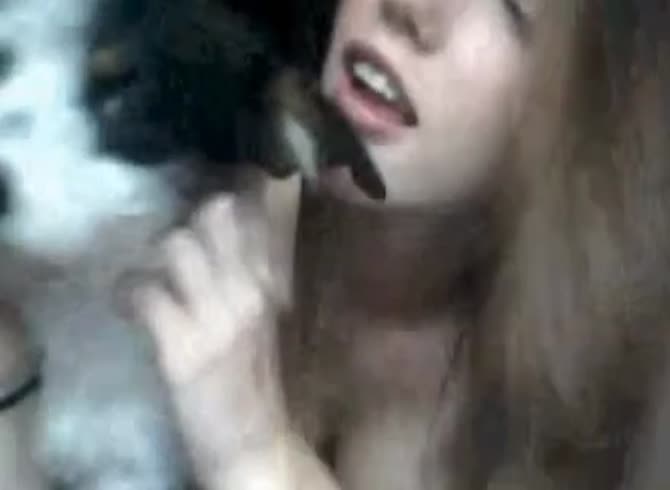 Video :Beautiful blonde teen kissing dog and have dog oral sex